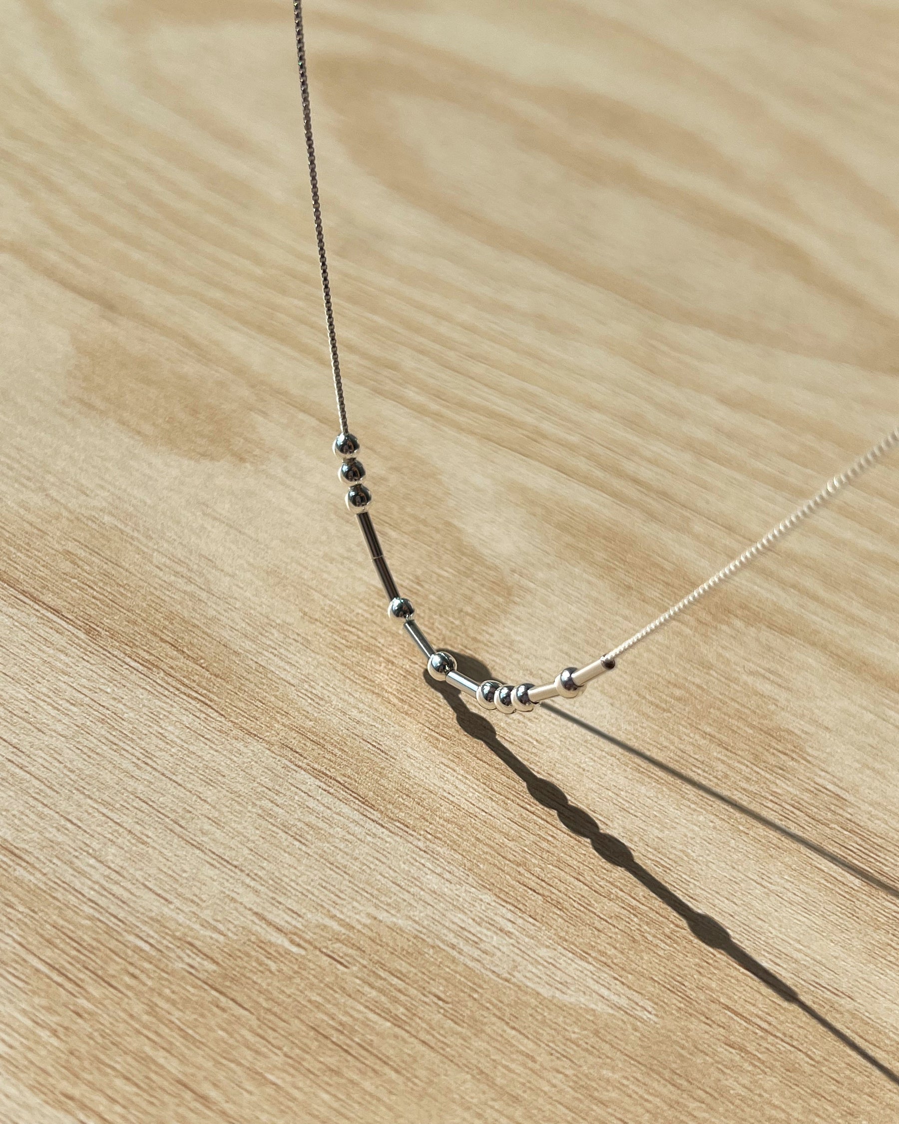Collier Code Morse